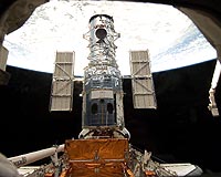 Astronauts wrap up 4th spacewalk to repair Hubble