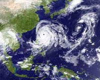 Krosa weaker, but rain pounds southeast China