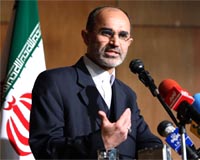 Iran warns about attack, refers to nuclear 'solution'
