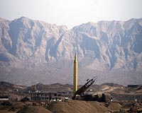 Defiant Iran test-fires long-range missiles