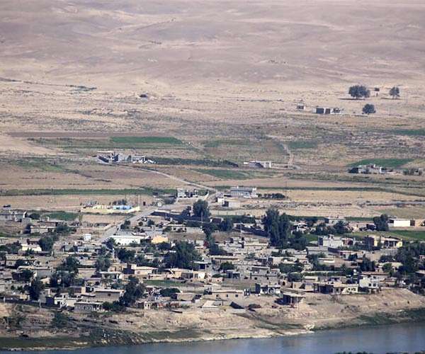 In drought-hit Iraq, a dam threatens to swallow farmland