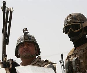 13 held after Iraq attacks kill 27 police