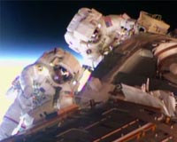 Spacewalking 'cable guys' wrap up work outside station
