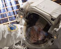 Astronauts hook up huge module to space station