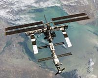 Discovery Returns Safely, Astronauts Make Space Travel Plea
