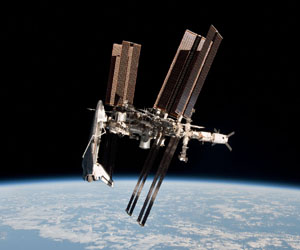 NASA releases first photo of shuttle docked in space