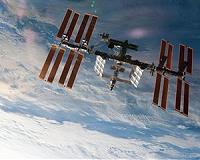 Russian Cosmonauts Carry Out Science-Oriented Spacewalk Outside ISS