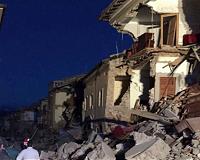 Italy PM vows to restore quake towns to former glory