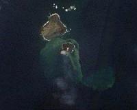 Japanese volcanic island swallows neighbor