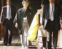 Analysis: Japan Balances History, Security