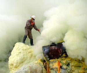 On an Indonesian volcano, one of the world's worst jobs