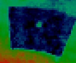A Dusty, Cloudy Exoplanet