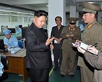 N. Korea's Kim Jong-Un reappears with walking stick