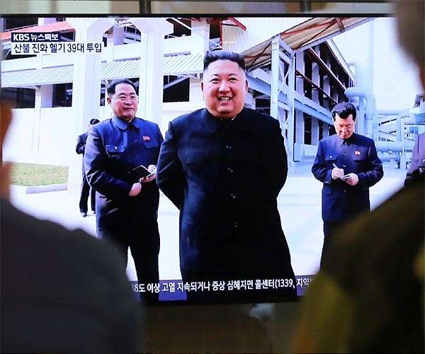 N. Korea's Kim issues warning on virus as health speculation swirls