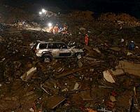 1 dead, dozens missing after China landslides: reports