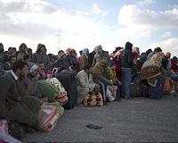 German minister cautions against terror-refugee link