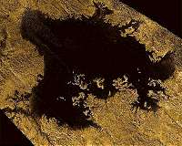 New photos show 'magic island' on Saturn's moon