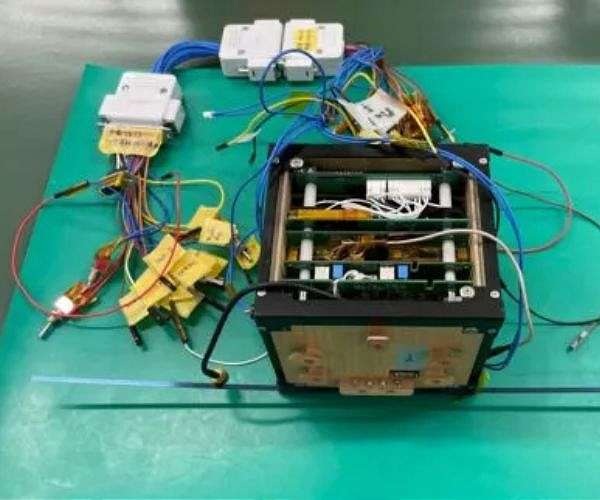 Small wooden satellite heads to International Space Station