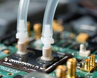 Liquid cooling moves onto the chip for denser electronics