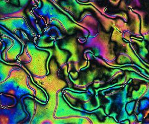 Silicone liquid crystal stiffens with repeated compression