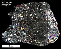 Application of laser microprobe technology to Apollo samples refines lunar impact history