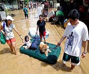 Disaster-weary Philippines mops up after deadly floods