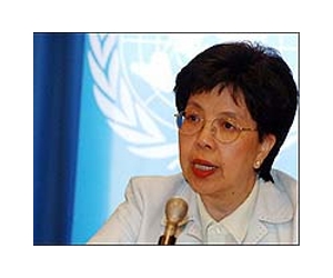 WHO chief warns against swine flu complacency
