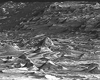 Mars Orbiter Examines Lace And Lizard Skin Terrain