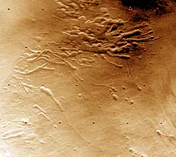 Erosional Valley Systems Across The Tharsis Montes