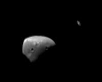 Mars Express views moons set against Saturn's rings