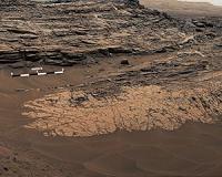 Rocks Rich in Silica Present Puzzles for Mars Rover Team