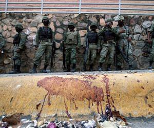 Mexican troops kill 12 suspects in gun battle