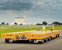 Specialized Transporters Move Core Stage of NASA's Space Launch System Rocket