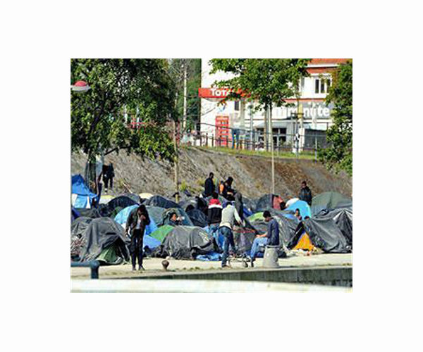 Rain floods Greece's largest migrant camp