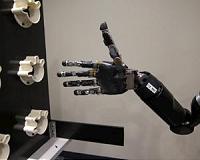 Pitt team publishes new findings from mind-controlled robot arm project