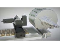 Continuous roll-process technology for transferring and packaging flexible LSI
