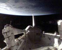 Shuttle Crew Inspects Heat Shield