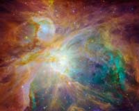 Spitzer And Hubble Create Colorful Masterpiece
