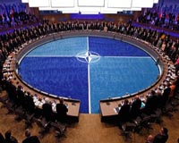 NATO deflects Trump criticism