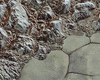 Pluto's close-up, now in color