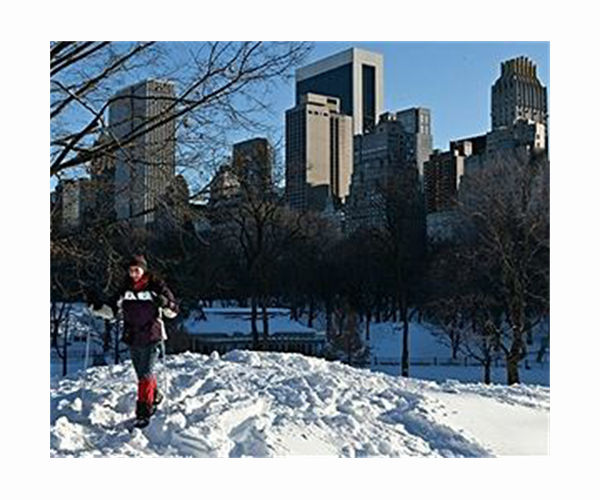 Snow brings joy, and misery, to pandemic-weary New York