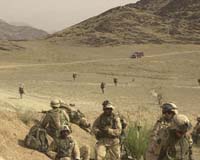 Gates wants more troops for Afghanistan in shift of priorities