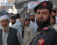 Suicide Bombers Kill Scores In NW Pakistan