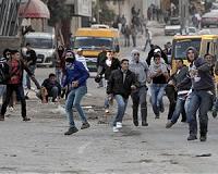 Thousands take to West Bank streets to support Abbas