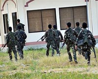 Philippines to hunt hardline rebels after capturing camps
