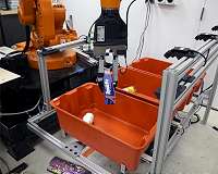 Robo-picker grasps and packs