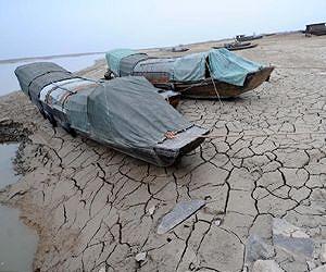 Storms, drought overshadow UN climate talks
