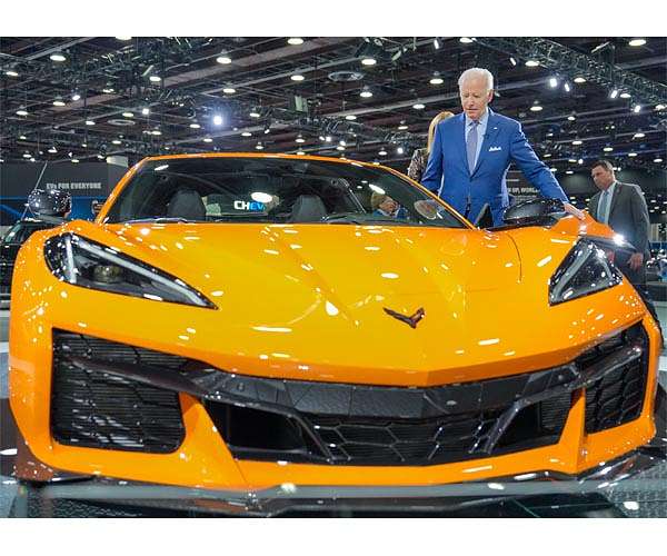Biden admin unveils tough emissions rules to speed electric auto shift