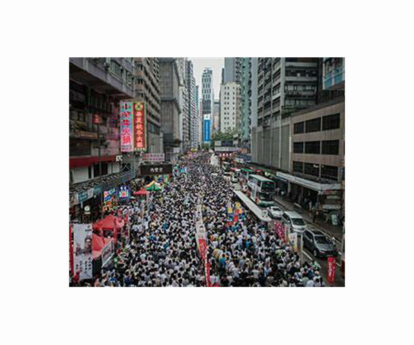 Veteran Hong Kong activists on trial over huge democracy rally