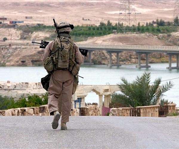Iraq says 'not happy' with 'dangerous' US pullout threat